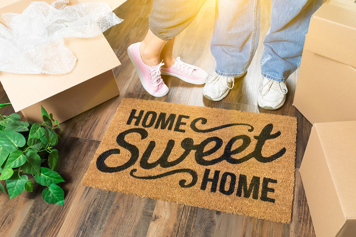 A welcome mat that says 'Home Sweet Home'